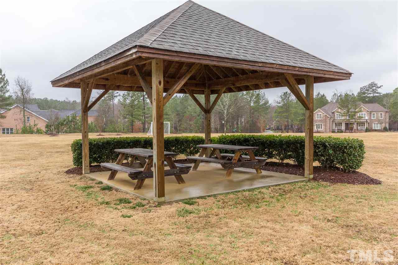 4600 Fielding Drive Raleigh, NC 27606 - Photo 25 of 25 an outdoor space with furniture and garden view