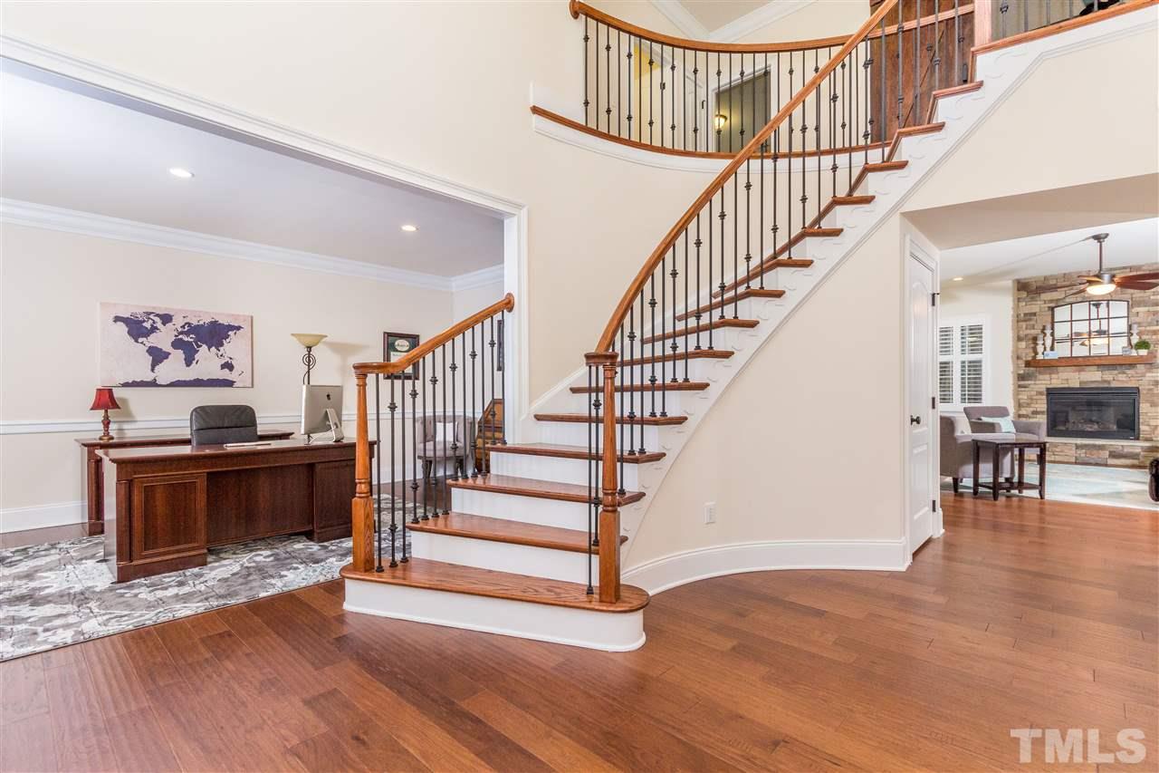 4600 Fielding Drive Raleigh, NC 27606 - Photo 4 of 25 a view of entryway and hall with wooden floor