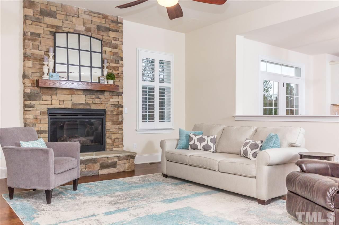 4600 Fielding Drive Raleigh, NC 27606 - Photo 9 of 25 a living room with furniture and a fireplace