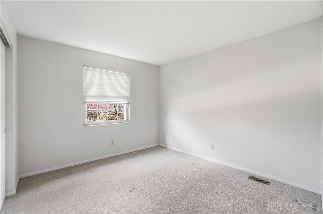 9964 Hummingbird Way Dayton, OH 45458 - Photo 38 of 57 This bright, airy bedroom offers a tranquil retreat with ample natural light.