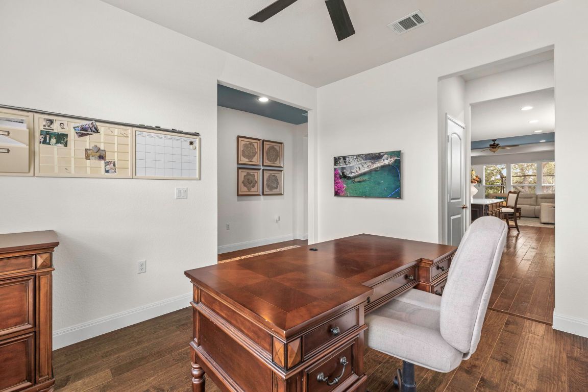 706 Kite Ridge Street Georgetown, TX 78633 - Photo 20 of 36 a living room with furniture and wooden floor