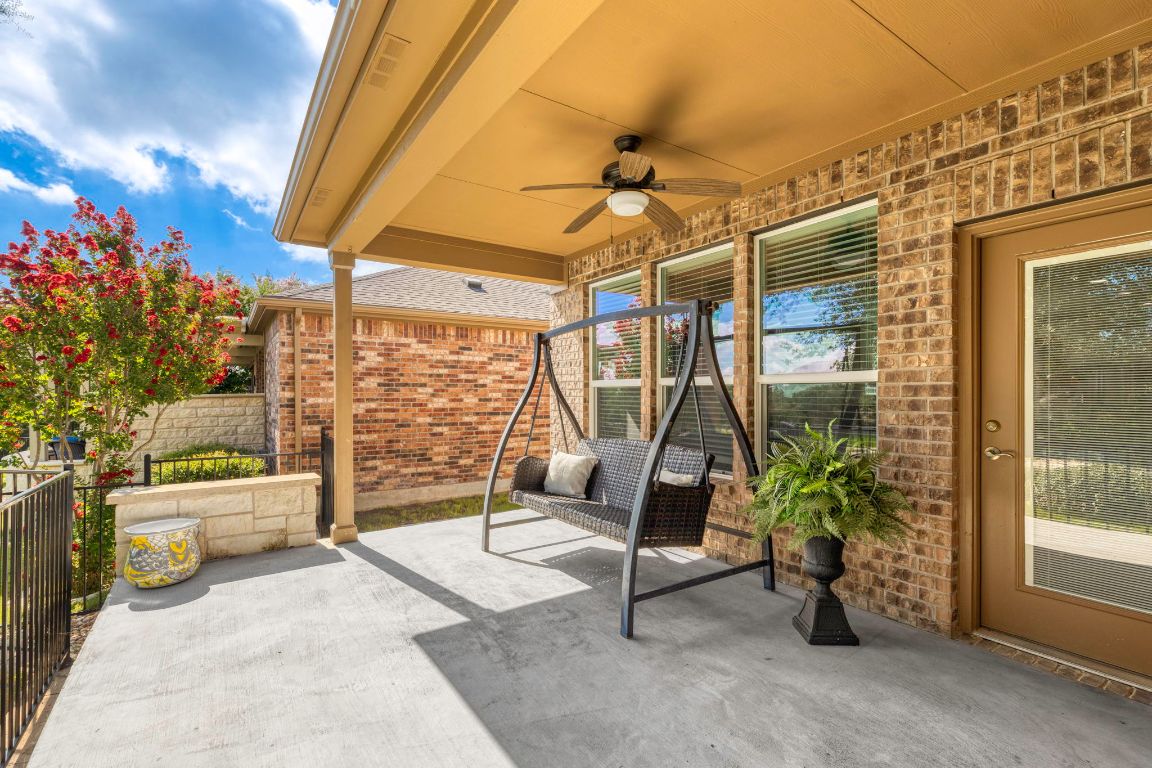 706 Kite Ridge Street Georgetown, TX 78633 - Photo 29 of 36 a view of a patio with table and chairs