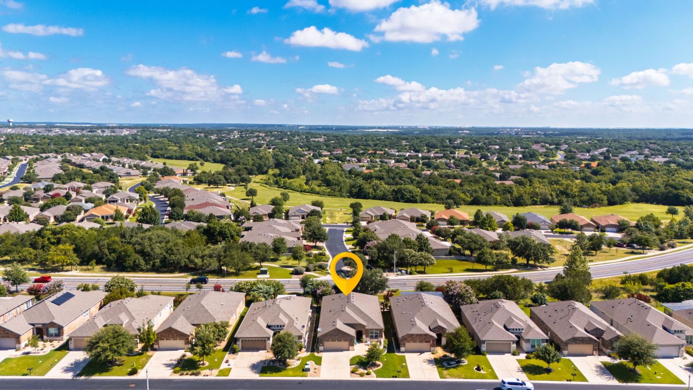 706 Kite Ridge Street Georgetown, TX 78633 - Photo 32 of 36 an aerial view of residential houses and outdoor space