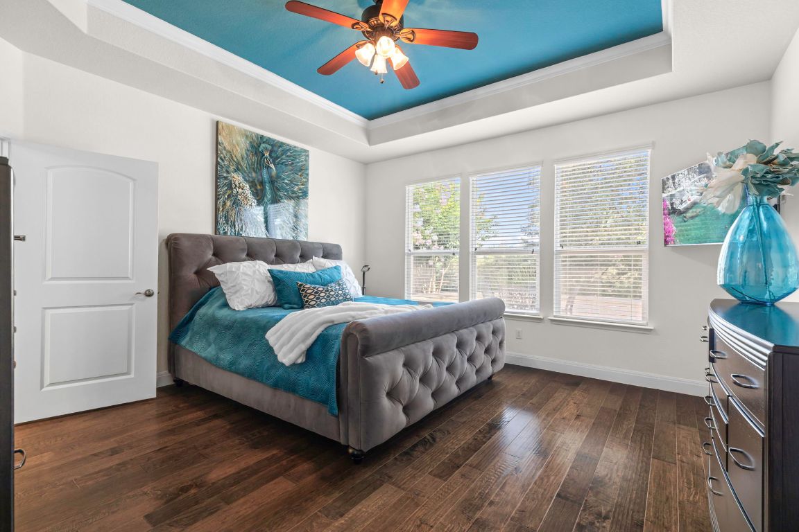 706 Kite Ridge Street Georgetown, TX 78633 - Photo 3 of 36 a spacious bedroom with a bed and window