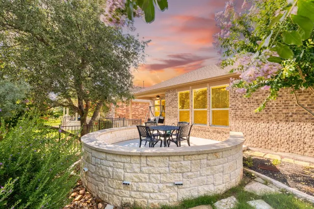 a spacious bedroom with a bed and window