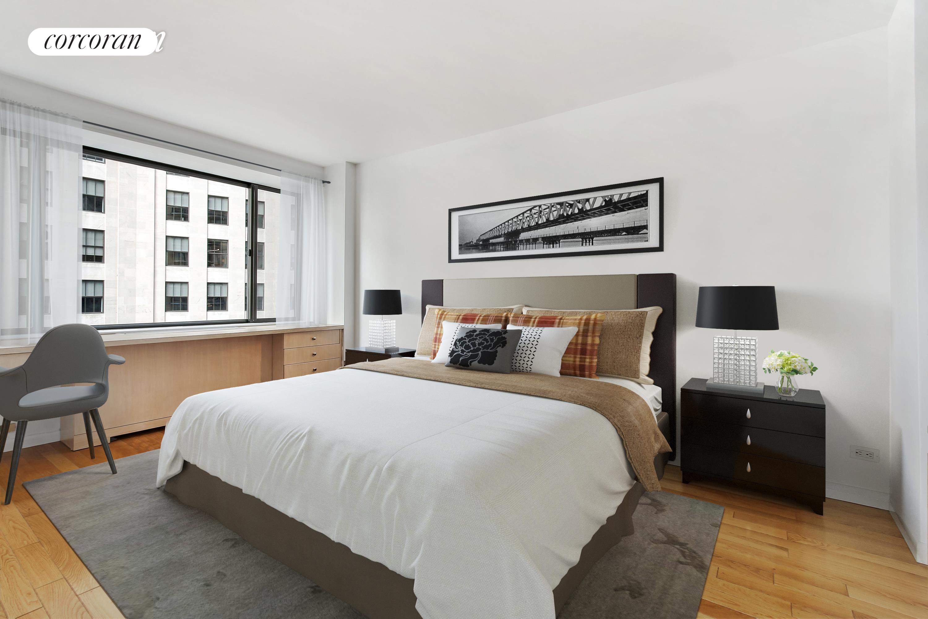 45 East 25th Street, Unit 27C Manhattan, NY 10010 - Photo 6 of 9 a bedroom with a bed and a couch