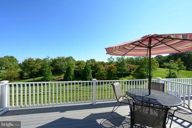 a view of a balcony with chairs