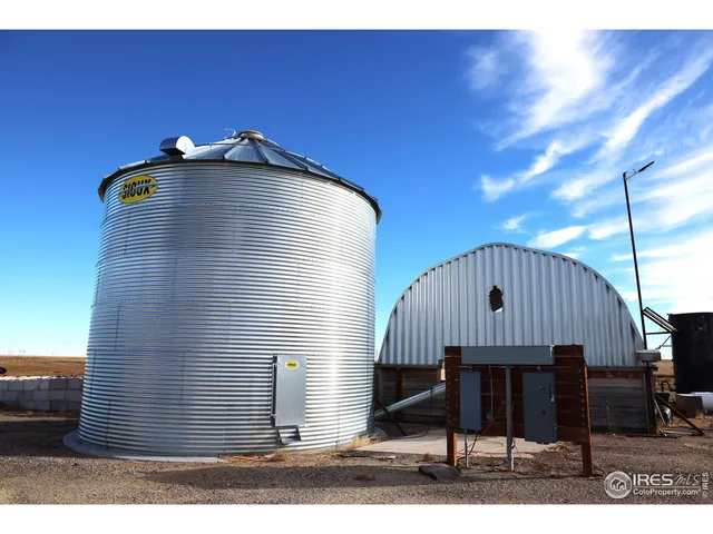 a front view of a house with garage