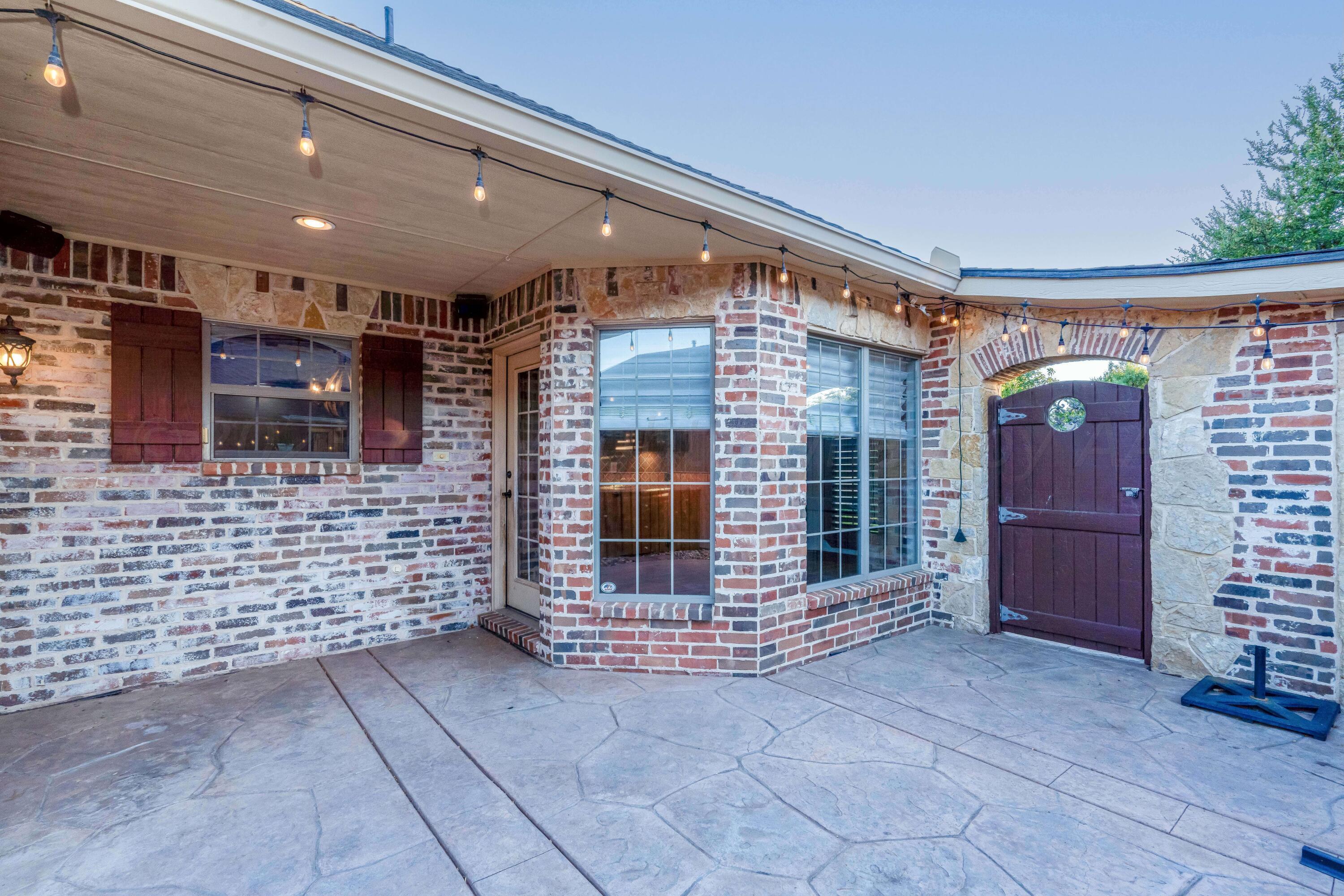 7606 Bayswater Road Amarillo, TX 79119 - Photo 15 of 65 7606 Bayswater-15 SIDE PATIO