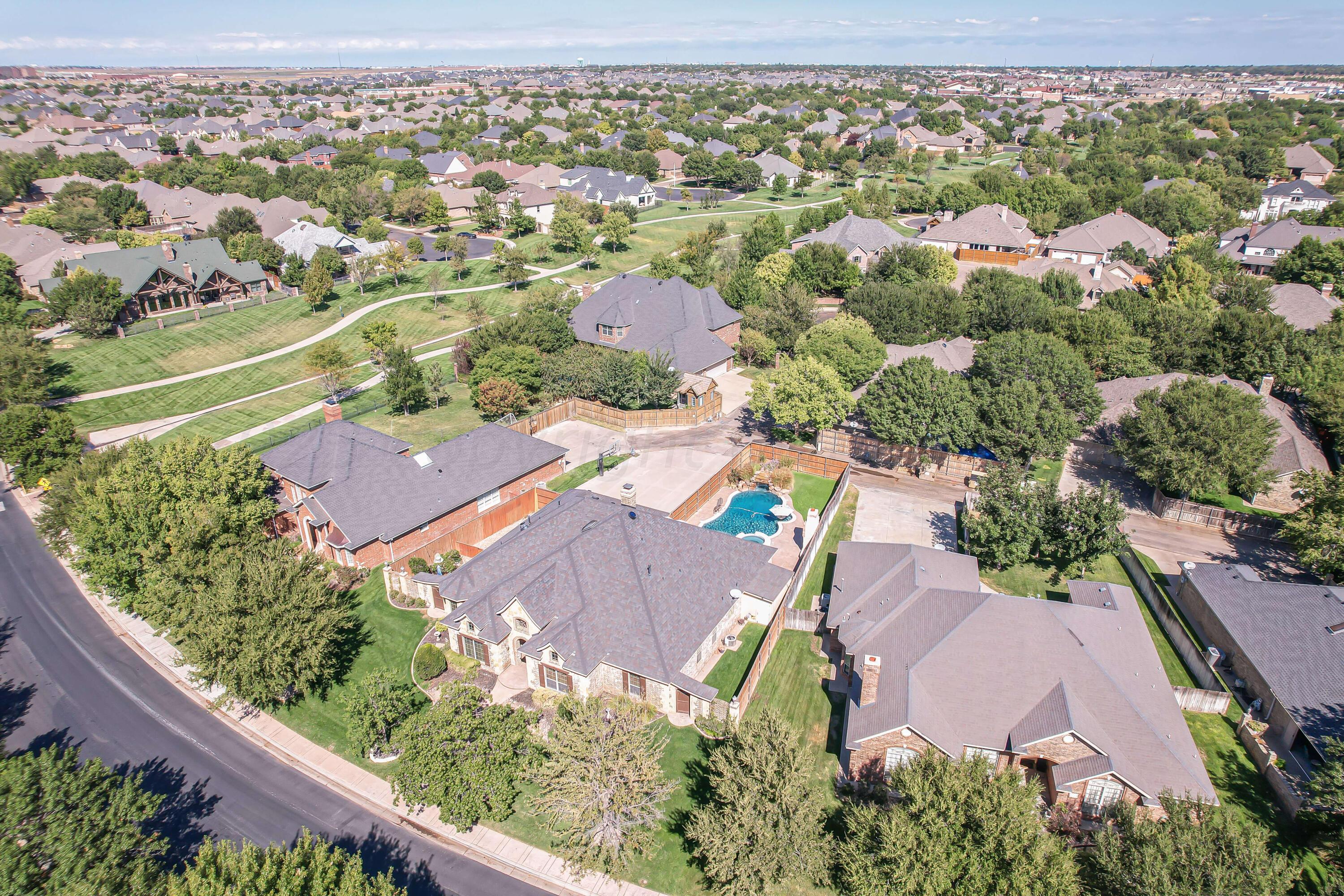 7606 Bayswater Road Amarillo, TX 79119 - Photo 17 of 65 an aerial view of a city with lots of residential buildings
