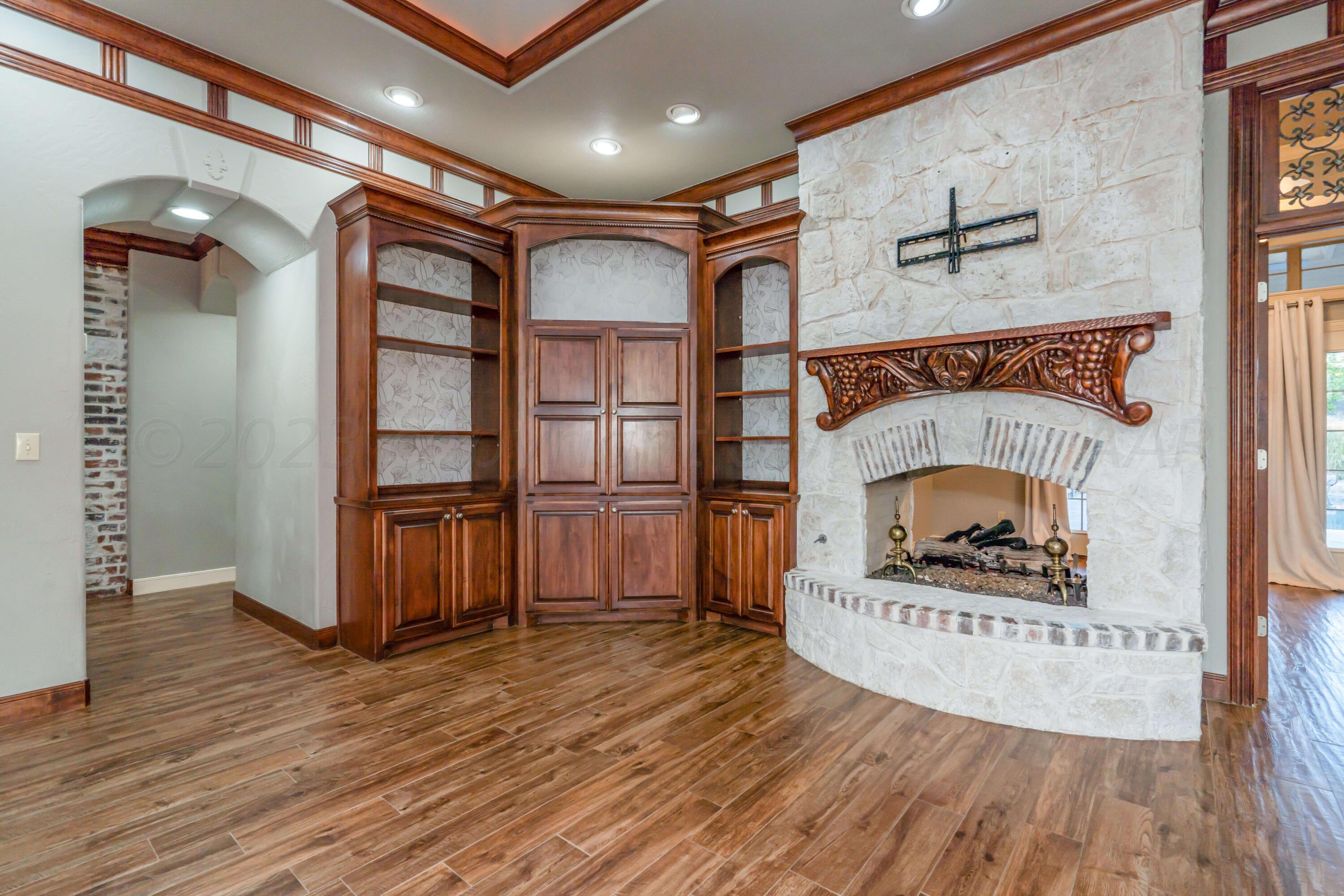 7606 Bayswater Road Amarillo, TX 79119 - Photo 23 of 65 a view of livingroom with furniture and wooden floor