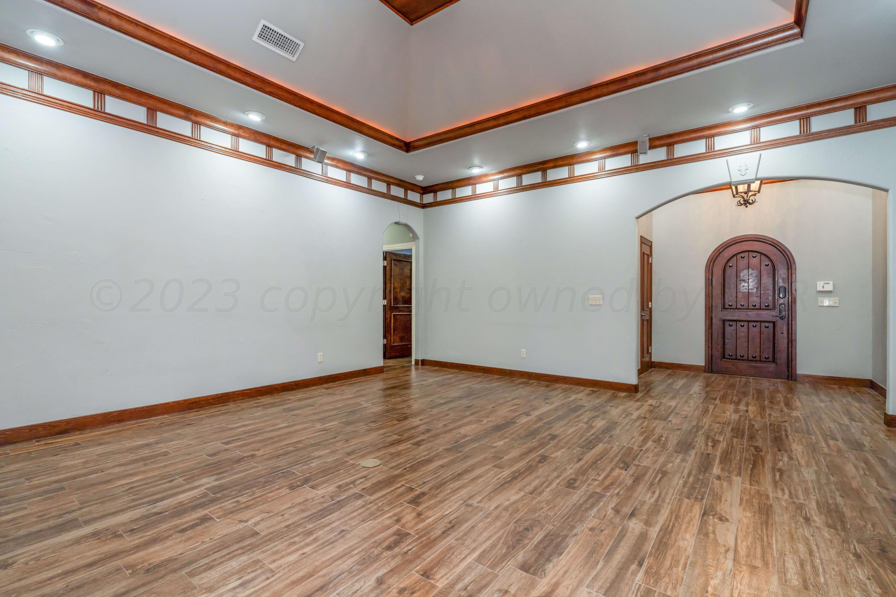 7606 Bayswater Road Amarillo, TX 79119 - Photo 25 of 65 a view of livingroom with wooden floor