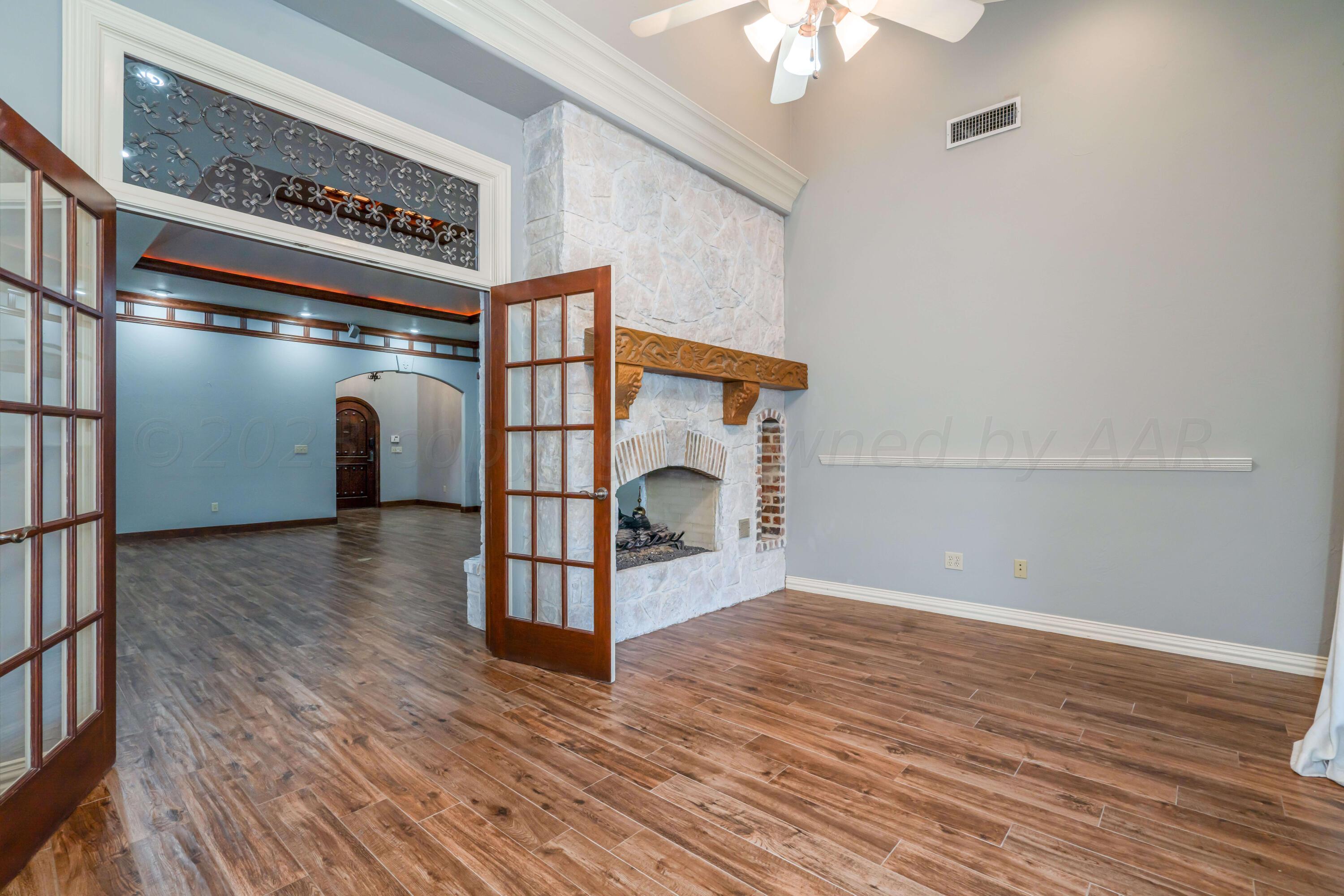 7606 Bayswater Road Amarillo, TX 79119 - Photo 28 of 65 a view of livingroom and hardwood floor