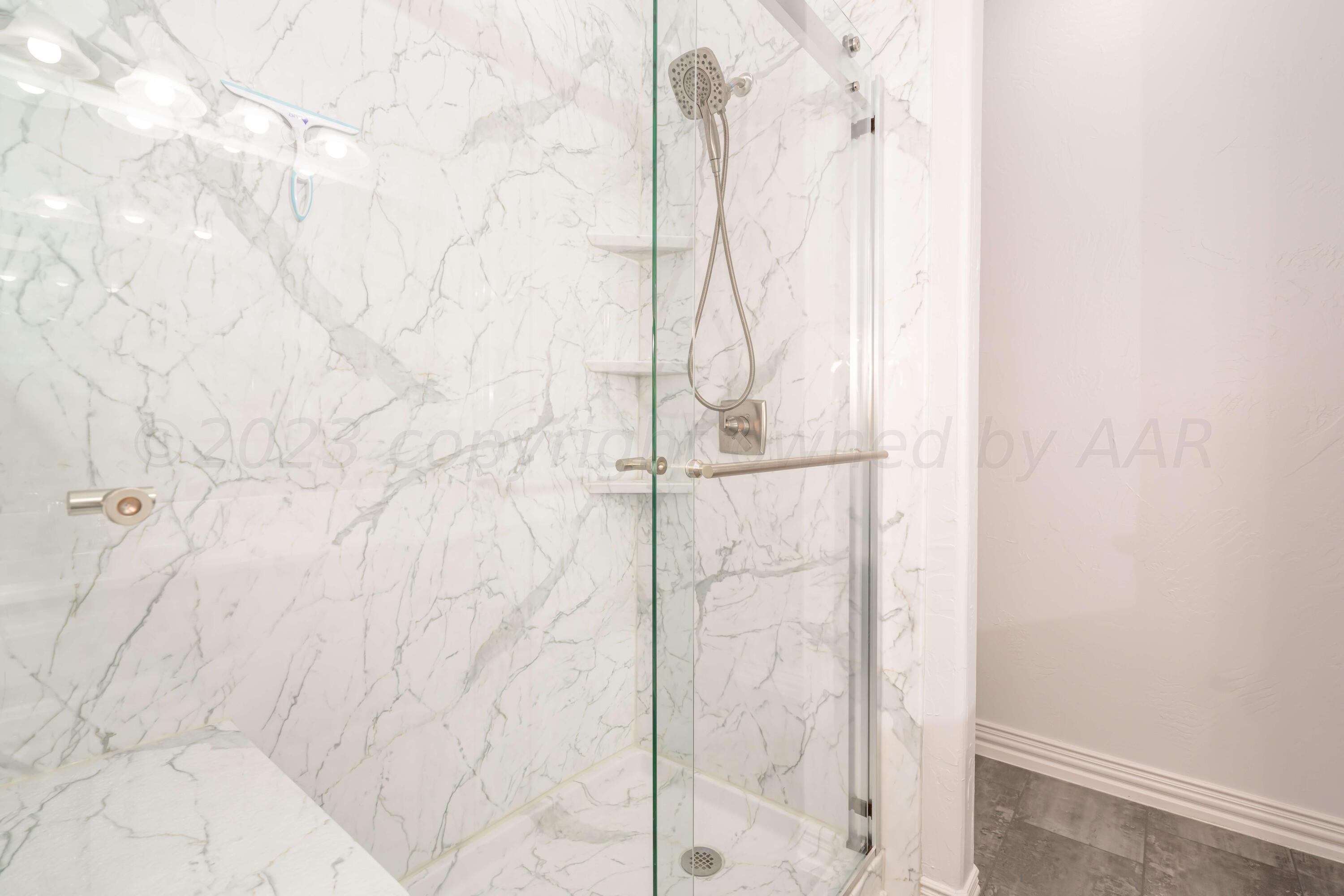 7606 Bayswater Road Amarillo, TX 79119 - Photo 59 of 65 a bathroom with a shower