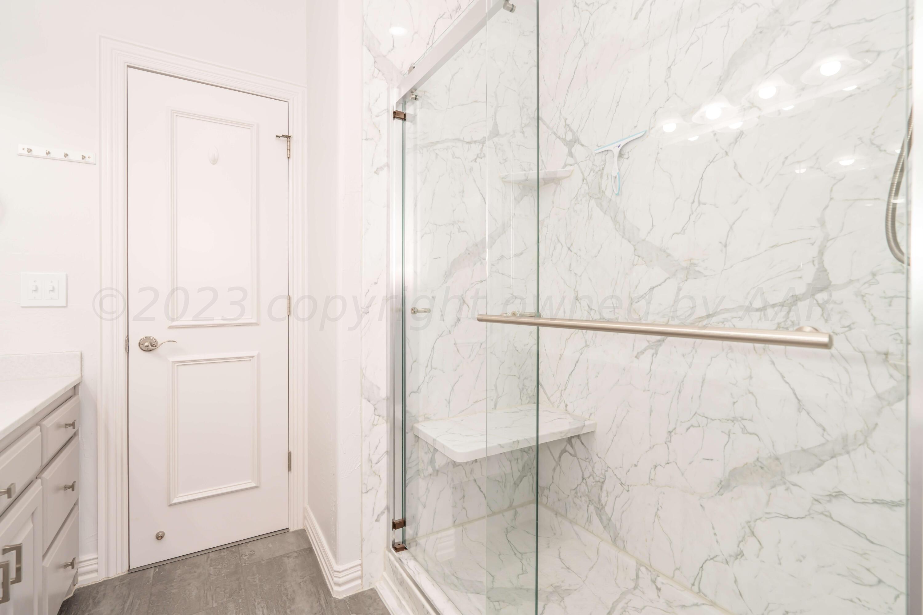 7606 Bayswater Road Amarillo, TX 79119 - Photo 60 of 65 a bathroom with a shower