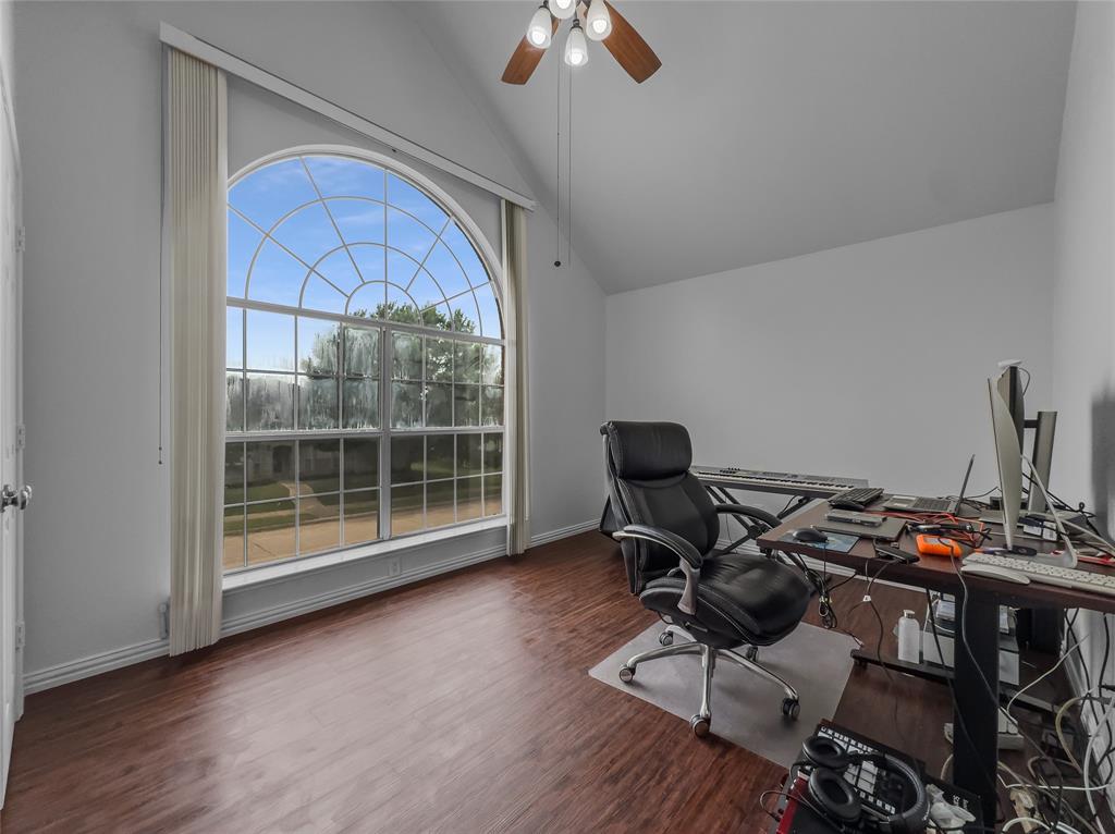 2317 Wellesly Road Rowlett, TX 75089 - Photo 27 of 39 a work room with furniture and wooden floor