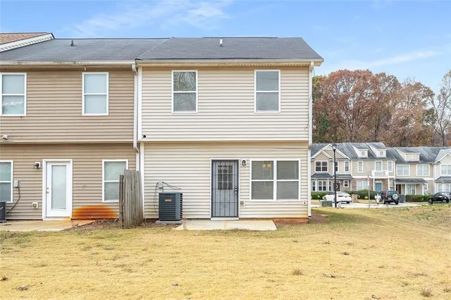 a view of a house with a swimming pool