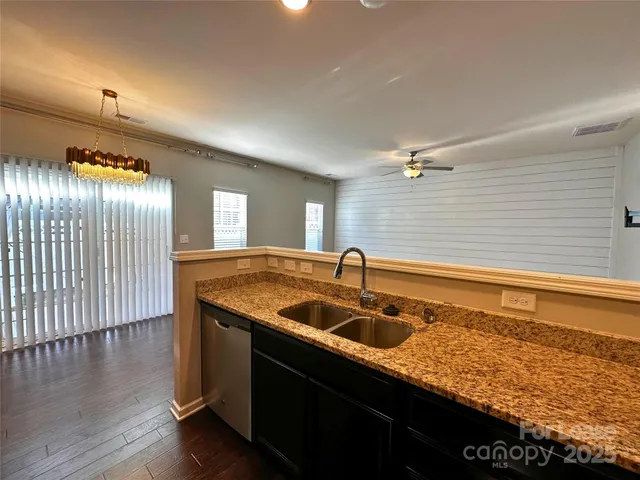 a bathroom with a sink and a large mirror