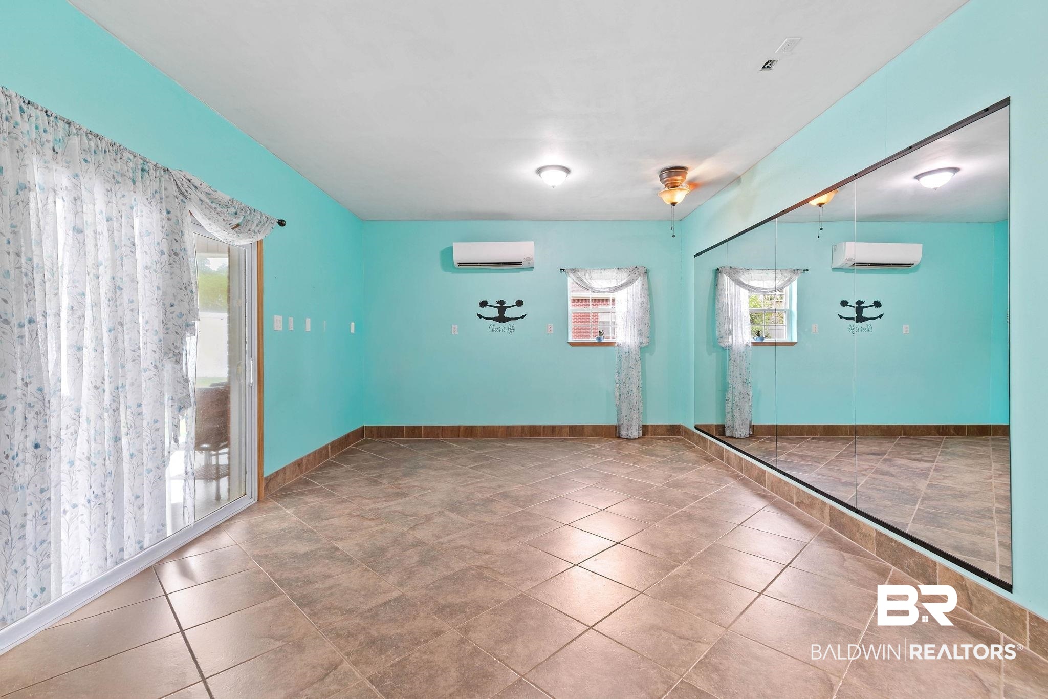 2 Speckle Trout Route Daphne, AL 36527 - Photo 46 of 61 Empty room featuring tile patterned floors and a wall mounted mini split