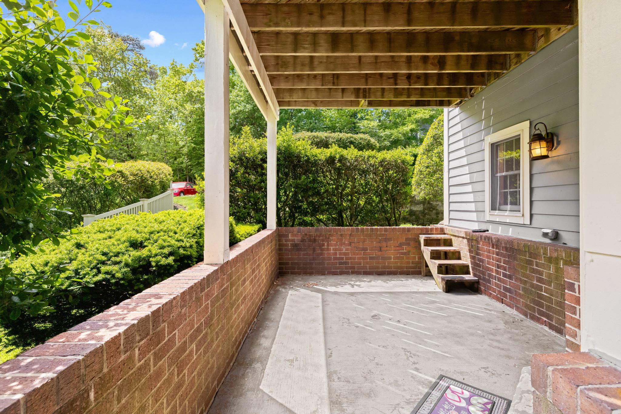 2702 Summerview Way, Unit 103 Annapolis, MD 21401 - Photo 11 of 18 a view of balcony with floor to ceiling windows and wooden fence