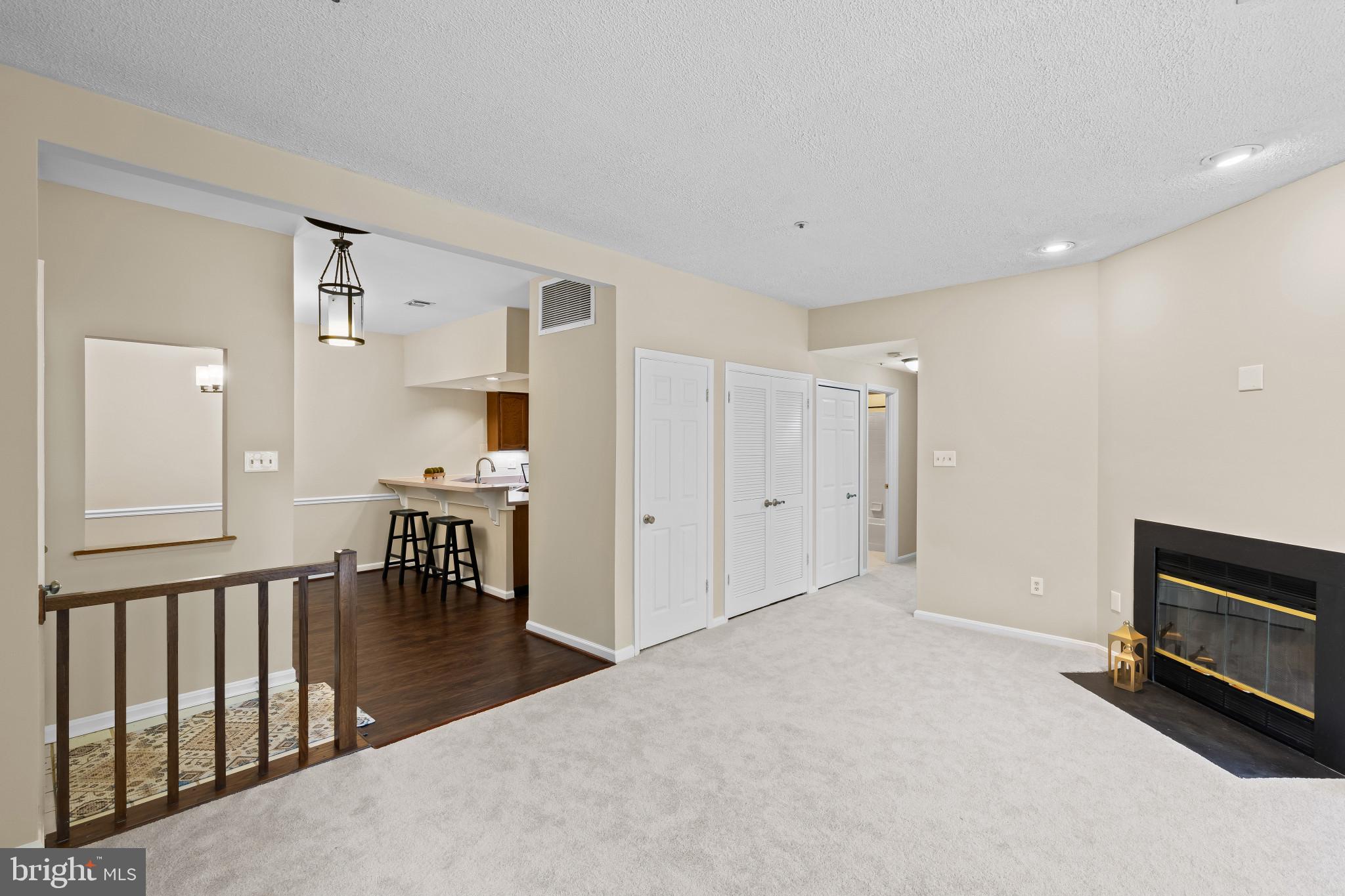 2702 Summerview Way, Unit 103 Annapolis, MD 21401 - Photo 4 of 18 a view of kitchen with furniture and large window