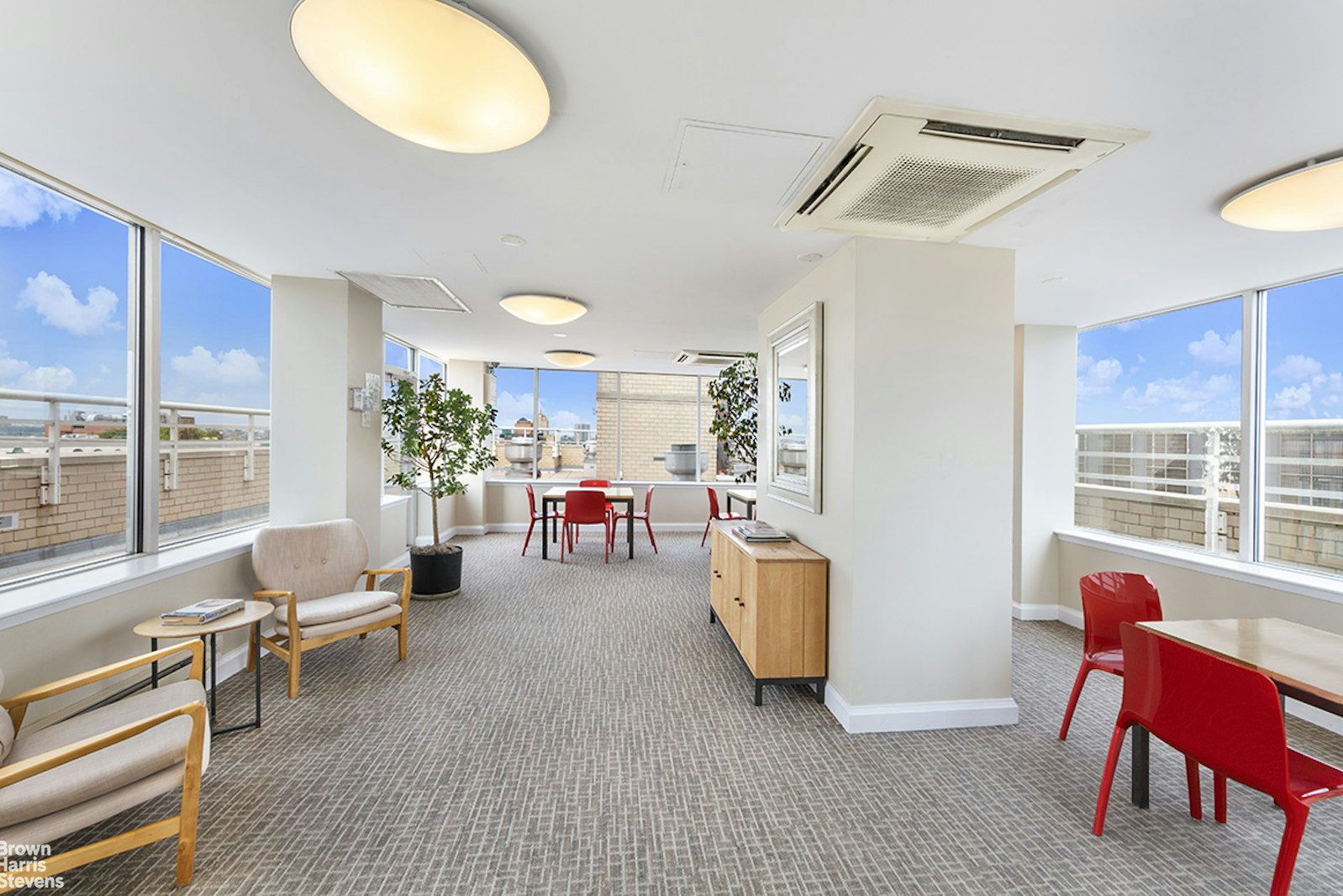 2373 Broadway, Unit 935 Manhattan, NY 10024 - Photo 14 of 17 a living room with furniture and a potted plant