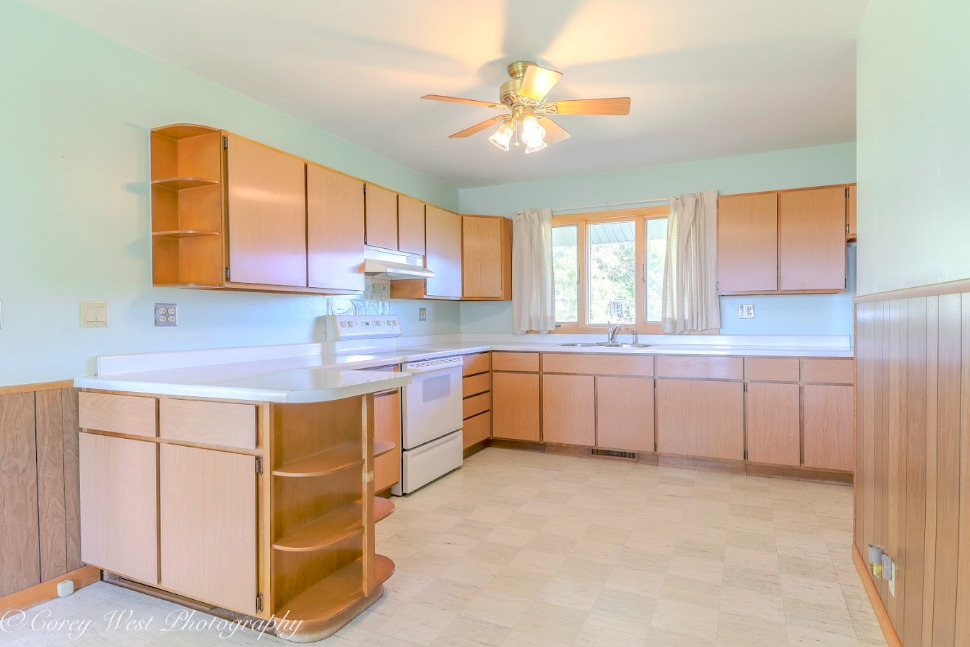 13432 Ash Road Genoa, IL 60135 - Photo 12 of 53 a kitchen with cabinets appliances a sink and a window