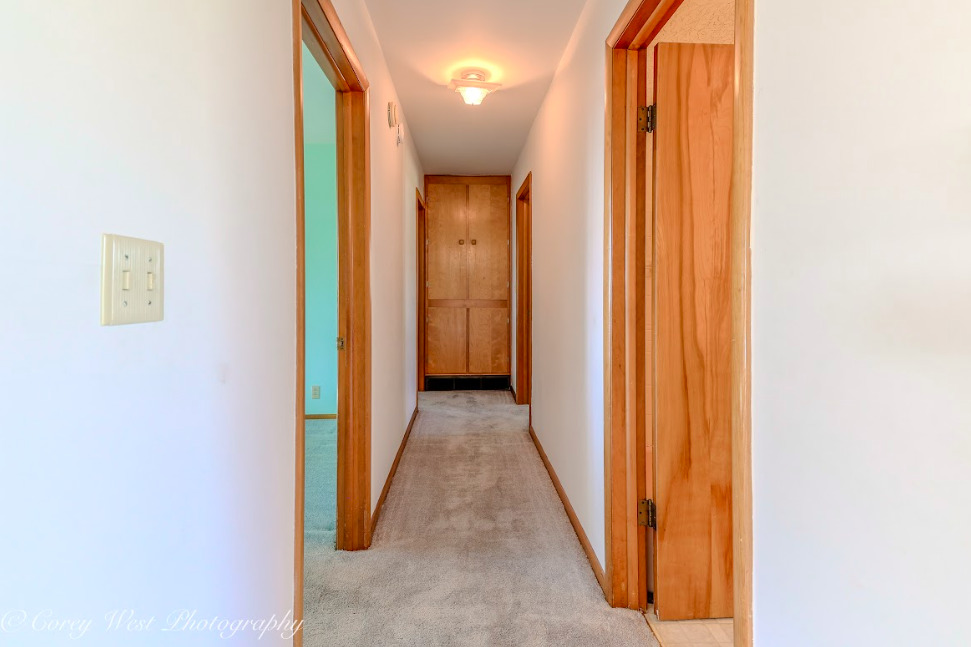 13432 Ash Road Genoa, IL 60135 - Photo 23 of 53 a view of a hallway with wooden floor
