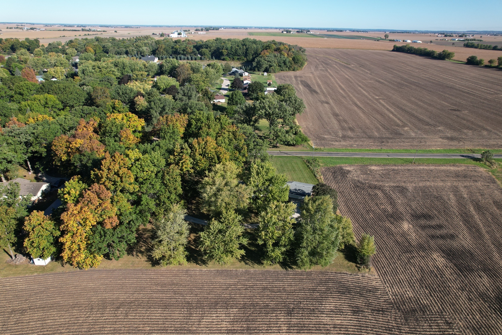 13432 Ash Road Genoa, IL 60135 - Photo 48 of 53 an aerial view of a houses with a yard