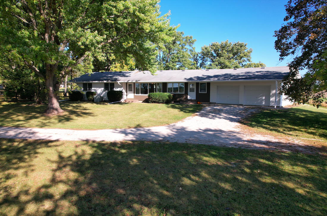 13432 Ash Road Genoa, IL 60135 - Photo 5 of 53 a view of a house with swimming pool