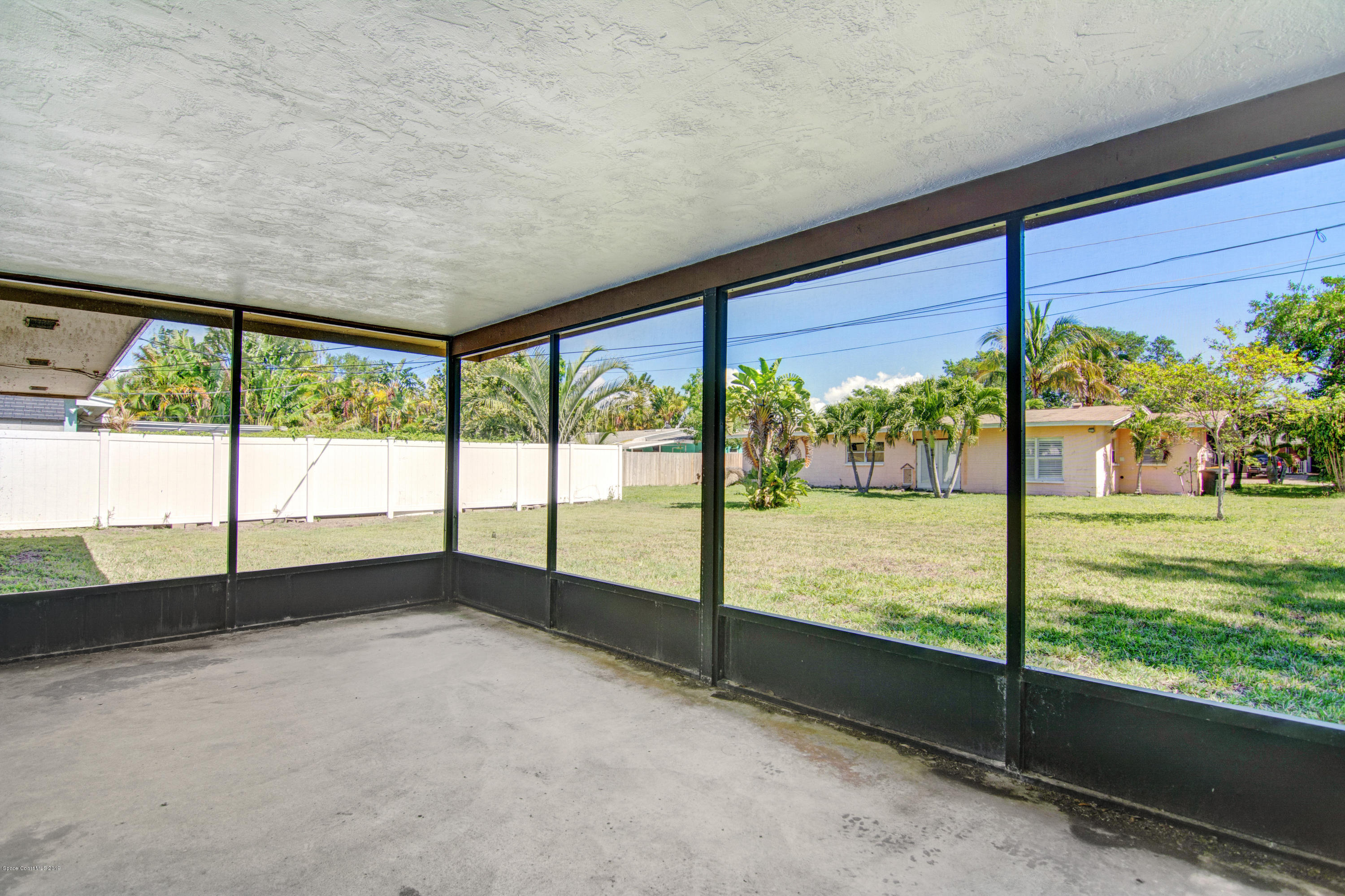 757 Nassau Road Cocoa Beach, FL 32931 - Photo 6 of 11 Screened-In Porch