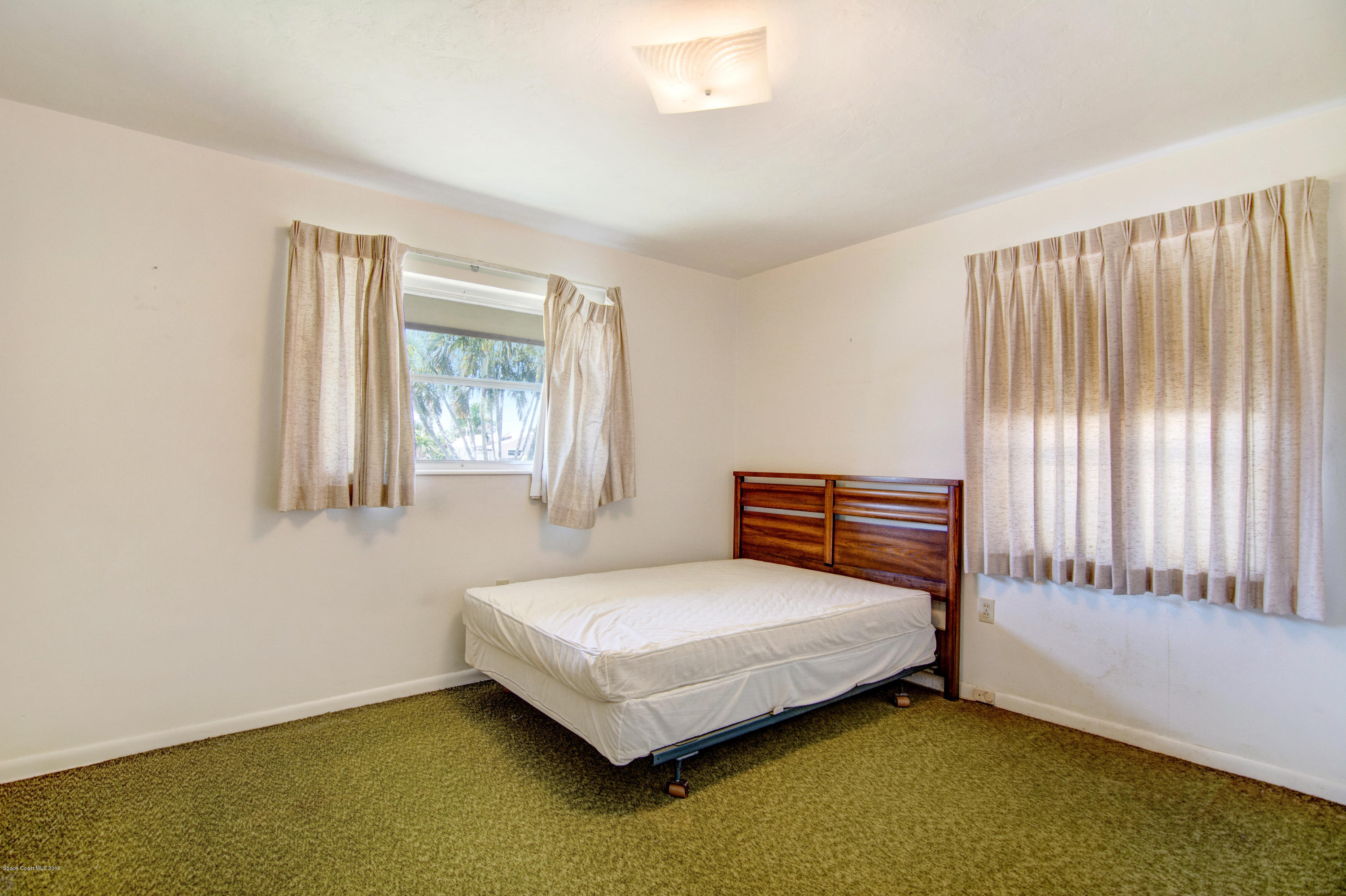 757 Nassau Road Cocoa Beach, FL 32931 - Photo 7 of 11 Master Bedroom