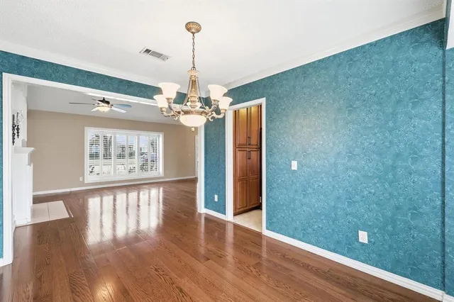 a view of a livingroom with wooden floor