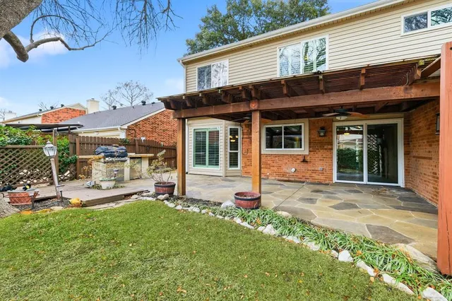 a view of a house with a patio