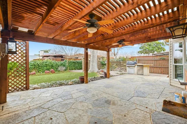 a large white building with a outdoor space