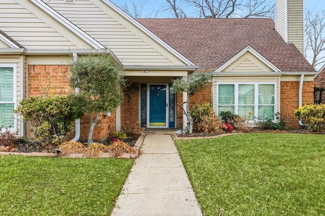 a view of a house with garden