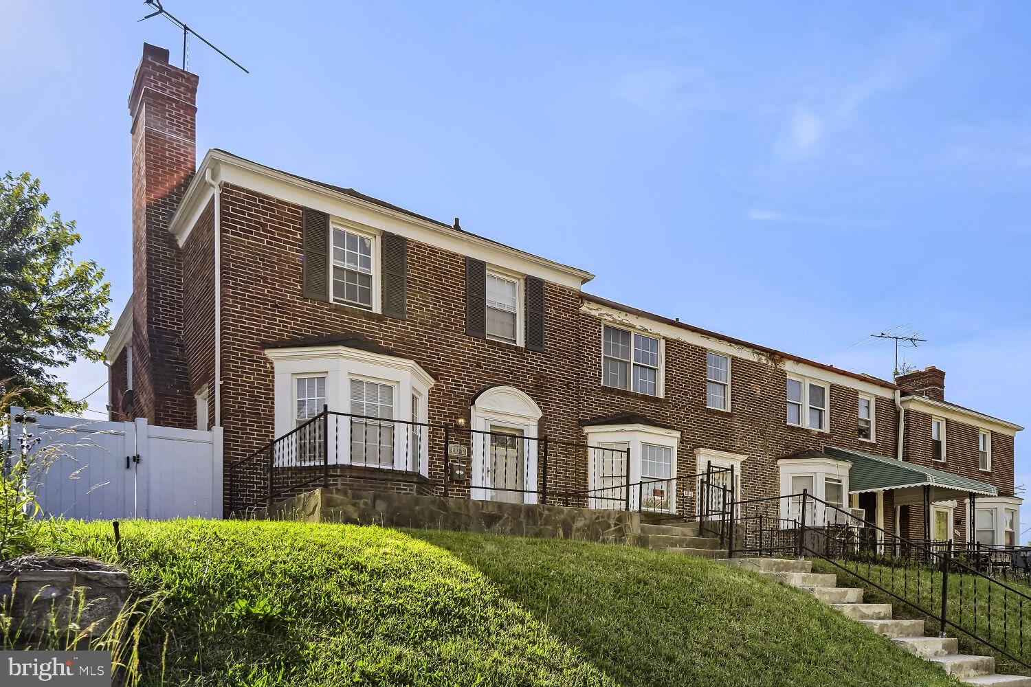 4012 Hillen Road Baltimore, MD 21218 - Photo 1 of 14 Charming brick townhouse with greenery.