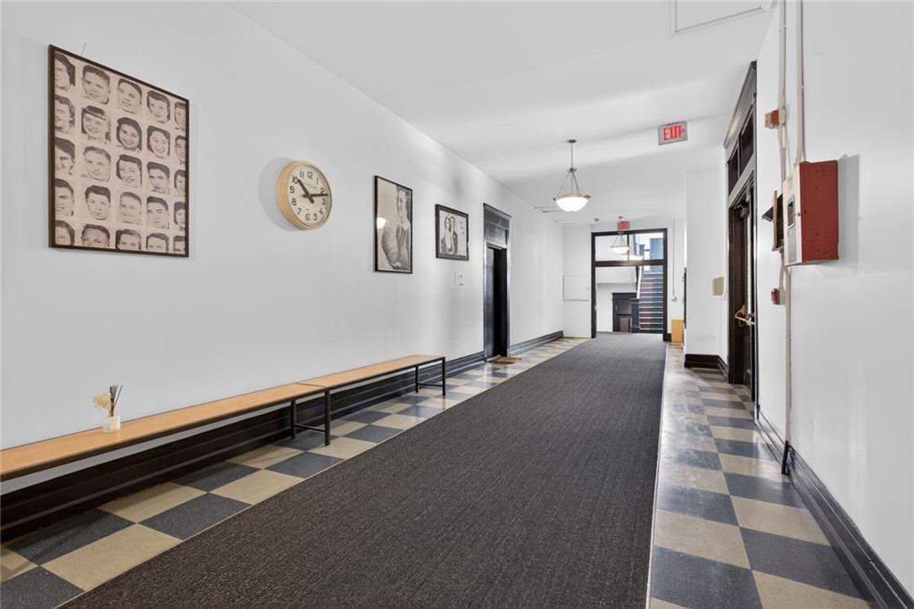 1031 State Street Northwest, Unit 205 Atlanta, GA 30318 - Photo 15 of 29 a hallway with windows