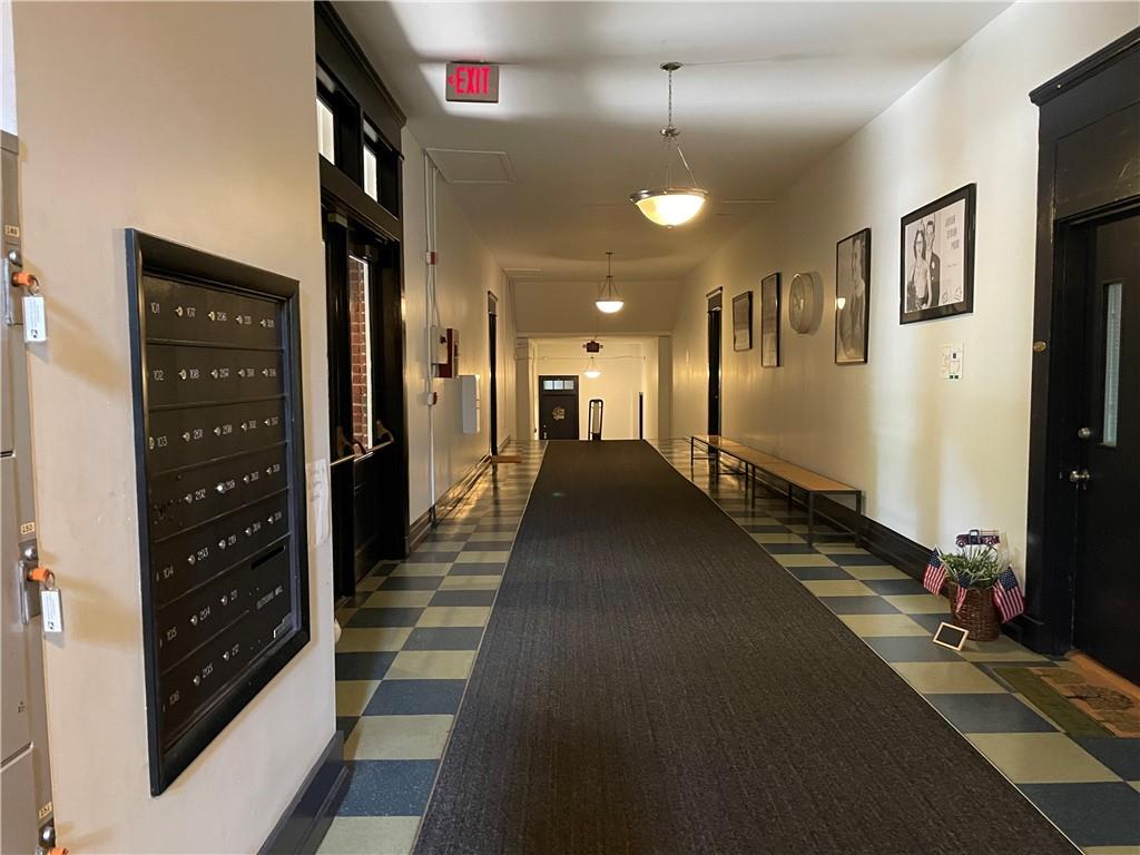 1031 State Street Northwest, Unit 205 Atlanta, GA 30318 - Photo 17 of 29 a view of a hallway with windows