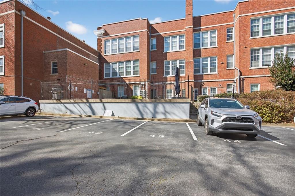 1031 State Street Northwest, Unit 205 Atlanta, GA 30318 - Photo 22 of 29 a car parked in front of a building