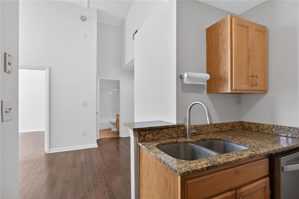1031 State Street Northwest, Unit 205 Atlanta, GA 30318 - Photo 6 of 29 a kitchen with sink and cabinets