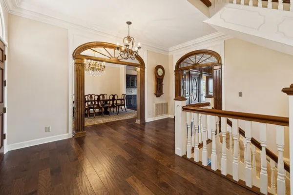 a view of a dining room with a chandelier