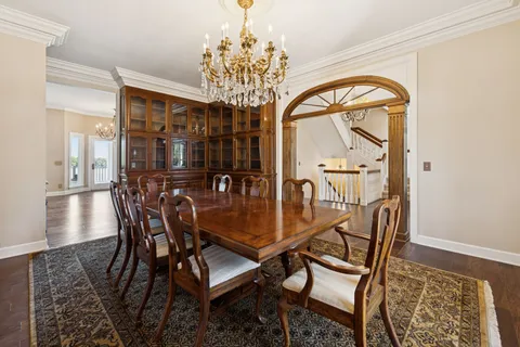 an aerial view of a houses with a lake view