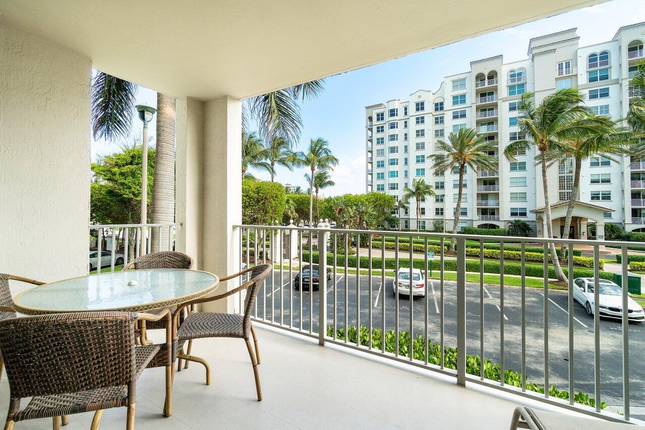 3594 South Ocean Boulevard, Unit 205 Highland Beach, FL 33487 - Photo 26 of 44 a view of a balcony and dining room