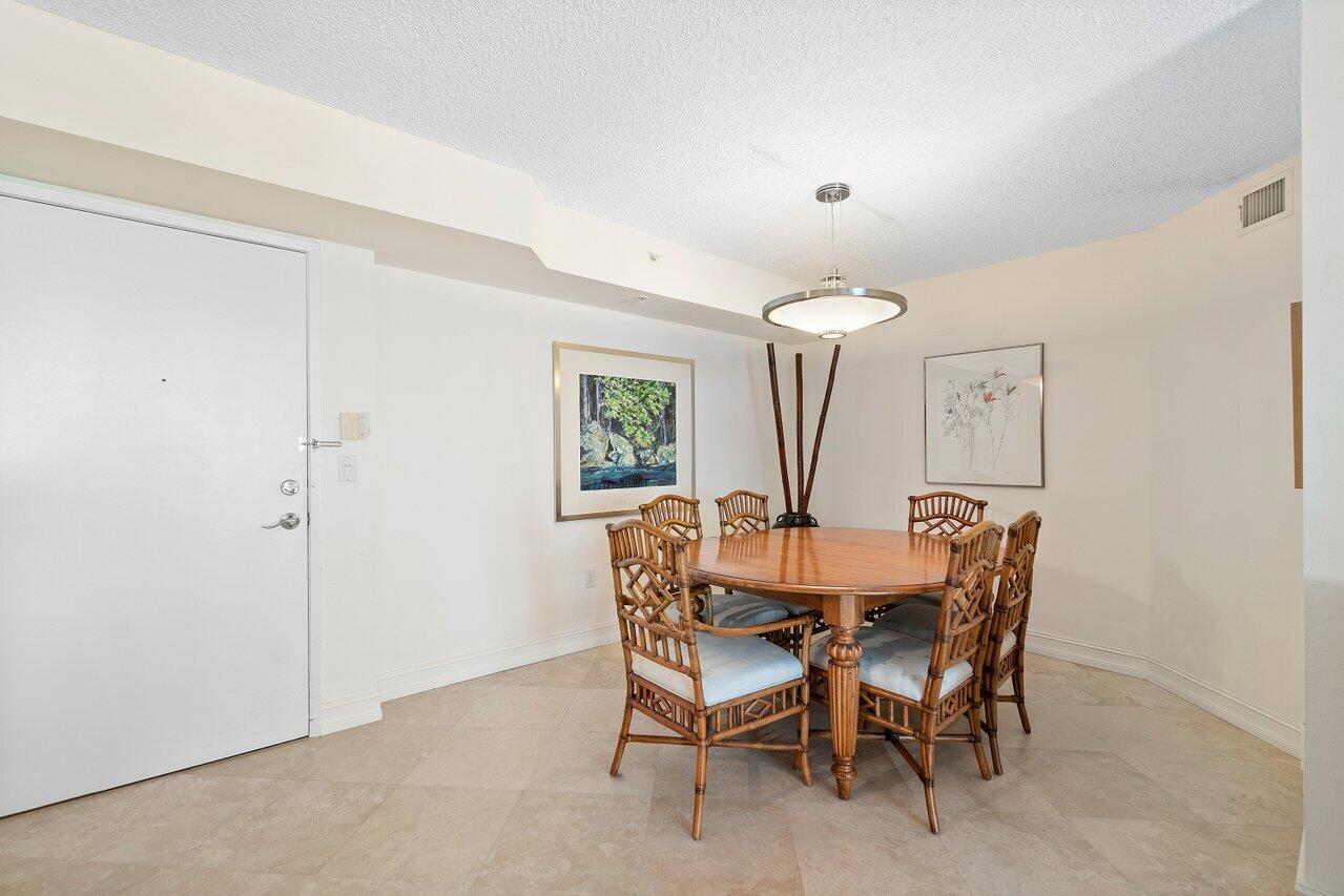 3594 South Ocean Boulevard, Unit 205 Highland Beach, FL 33487 - Photo 3 of 44 a view of a dining room with furniture