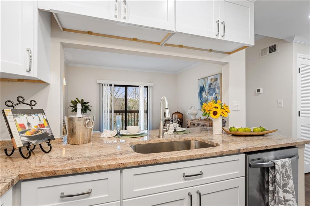 1800 Clairmont Lake Decatur, GA 30033 - Photo 13 of 31 a kitchen with sink and potted plant