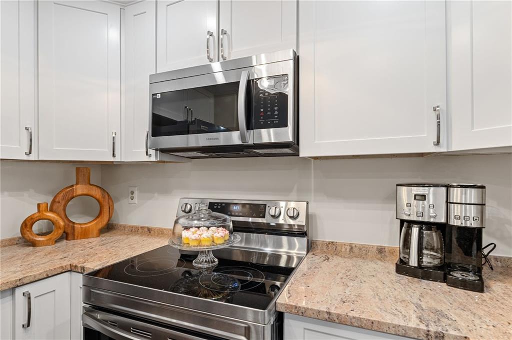 1800 Clairmont Lake Decatur, GA 30033 - Photo 14 of 31 a kitchen with a stove and cabinets