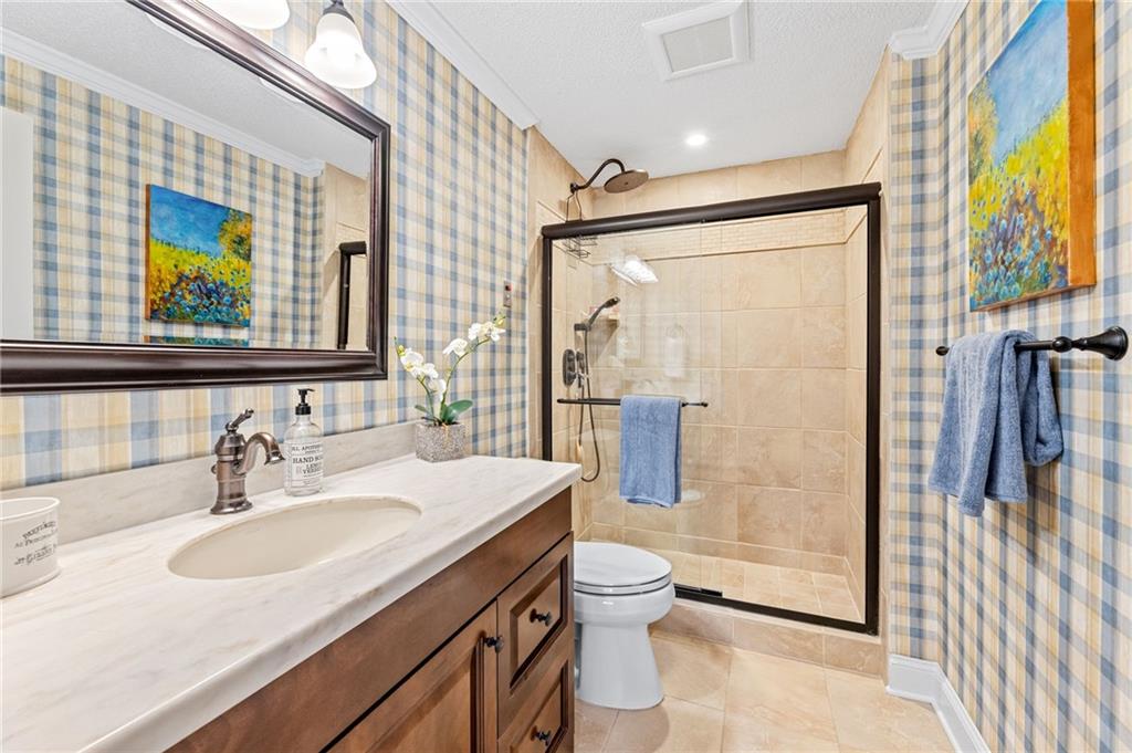 1800 Clairmont Lake Decatur, GA 30033 - Photo 22 of 31 a bathroom with a sink toilet and shower
