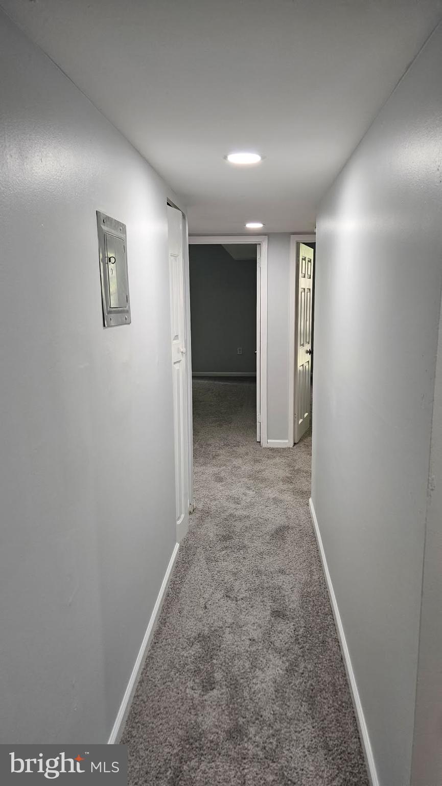 8671 Greenbelt Road, Unit 101 Greenbelt, MD 20770 - Photo 12 of 15 an empty room with closet