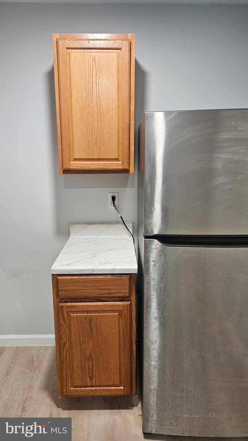 8671 Greenbelt Road, Unit 101 Greenbelt, MD 20770 - Photo 15 of 15 a utility room with dryer and washer